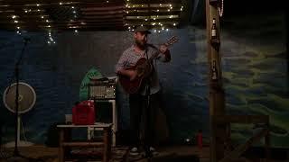 Jonathan Puzan singing one of his originals "Known By Numbers".