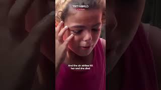 Palestinian child mourns her sister killed by Israel