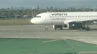Incident: Volaris A320 at Los Angeles on Feb 17th 2019, luggage cart hits aircraft during line up