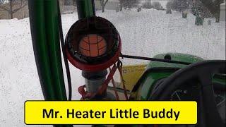 Mr. Heater Little Buddy in a John Deere Tractor.