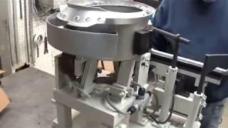 PALNUT FEEDER BOWL WITH SPECIAL FLOATING MANDREL SATISFYING ROBOT- Feeding Concepts, Inc.