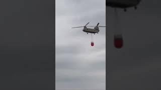 CH47 With Water Bucket Fighting Fires