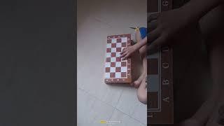 Unboxing the wooden chess board.