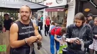 Savage:  Man Eats A Raw Squirrel At A Vegan Market In London!