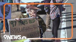 97-year-old joins hundreds at Rocky Mountain National Park protest