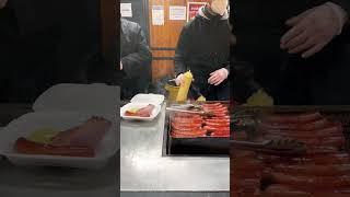 Prague. Czech Republic. Czech street food. Pork ham and sausage.  Old Town Square.