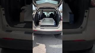 2015 Chevy Traverse can accommodate 30x80 doors with trim.