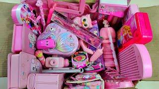 Box full of fancy pink stationery items, USB pench box, piggy bank, pencil sharpener, colour kit,toy