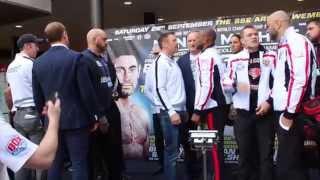 STEVE COLLINS SHOVES PROMOTER VLAD HRUNOV DURING HEAD TO HEAD WITH ROY JONES