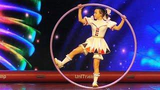 Aralova Kira - composition "Doll", a young acrobat - equilibrist on the Cyr Wheel.