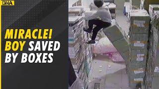 Viral Video: Boy falls into a storage hole, saved by pile of boxes