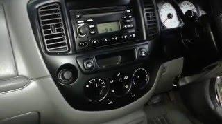 How to remove the factory radio from a  Ford Escape/ Mazda Tribute