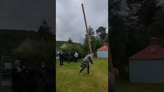Kyle Randalls demonstrates Highland Games caber toss, Braemar, Scotland, 2022-08-26