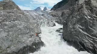 Glacial flood waters thunder off of Mendenhall Glacier August 5, 2023