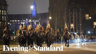 Midnight coronation rehearsal sees military parade through empty London streets