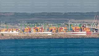 Aerial view of container cargo terminal of commercial port timelapse, business logistics and