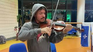 A man from Costa Rica plays the violin 