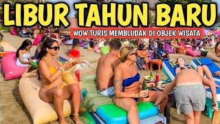 TURIS ASING MEMBLUDAK DI PANTAI SEMINYAK BALI LIBUR TAHUN BARU