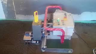 Floor screeding - automatic laser level machine at work