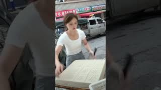 "Selling Tofu at Street Stalls for Small Business"