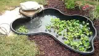 Outdoor fish pond water feature - clean and simple