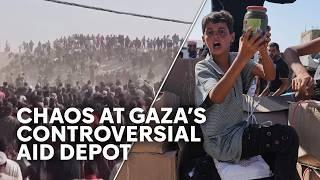 Israel-Gaza war: desperate Palestinians storm aid depot