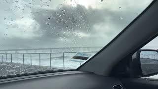 My ride getting splashed at Pacifica Pier in between storms.