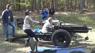 Firing 75mm pack Howitzer