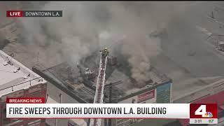 Nearly 100 firefighters battle commercial fire in Downtown LA