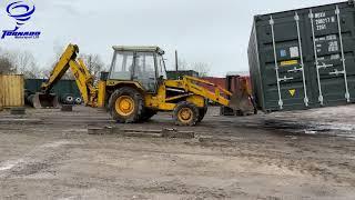 Can a JCB 3CX lift and move a 20ft shipping container?