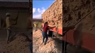 Unloading hay the hard way: woman's incredible strength!