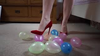 Louboutin heels bursting, squashing, crushing balloons/Trampling, popping balloons with high heels