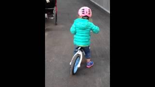 Maddie gliding on her balance bike