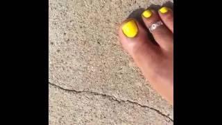 Alexis, toesofalexis crushing little ants with your pretty bare foot, in yellow toe nail