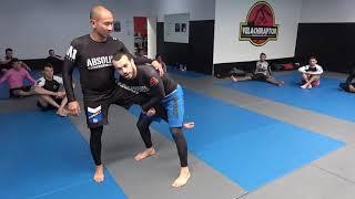 Single leg takedown. Finish with run the pipe or lift the leg