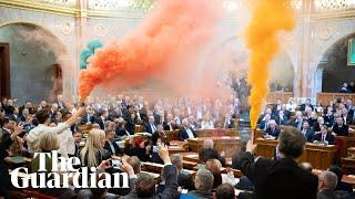 Smoke bombs ignited as Hungarian parliament passes law banning Pride events