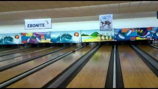 Funny girl playing bowling