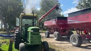 John Deere 4020 on a grain vac