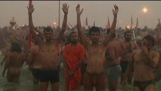 Hindu festival: Millions take a dip in the Ganges river