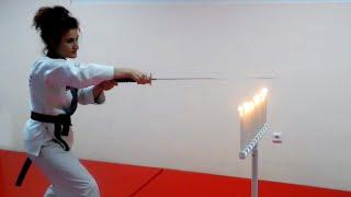 HAPKIDO MAGNUS LIPETSK - Marina Znova.Putting out candlelights with sword (HAPKIDO, KUMDO DEMO)