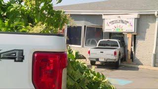Truck crashes into child care center in Bedford Heights; driver later dies at hospital