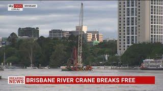 Pontoon carrying crane breaks free on Brisbane River