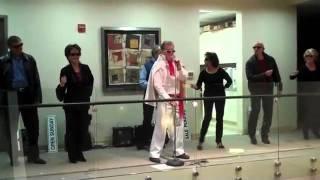 Gregory Strang and the Realtorettes Sing Blue Christmas at the Burlingame Office Holiday Party