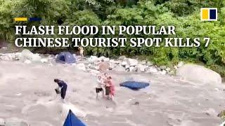 Flash flood in in popular Chinese tourist spot kills 7, injures 8