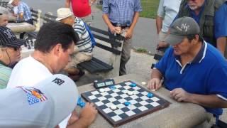 Aleksandr Golodiev vs. Mikhail Layevskiy playing 64 squares Checkers