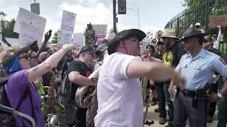 Musicians surround Proud Boys, drown them out with tubas at 'No Kings' protest in Atlanta