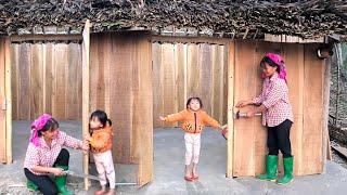 Bông and mom was happy when finished the wooden wall for the house after much effort and hard work