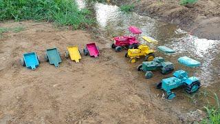 The children left the tractor trolley and went into the river and took the tractor out of the river