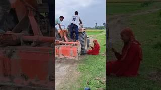 The tractor runs over the foot.
