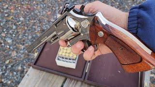 Smith and Wesson model 29-2, the Dirty Harry gun, 8 3/8 barrel, and a pumpkin